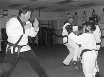 Steve instructing martial arts students in his dojo